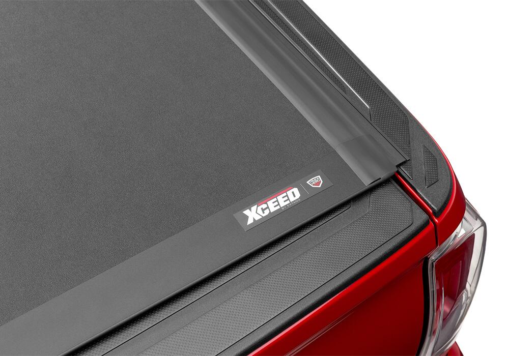 Ex_Xceed_20RedTacoma_Badge.jpg